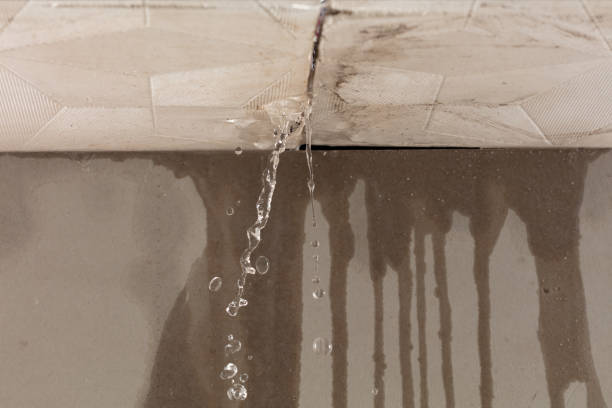 Professional Flood Damage Cleanup technician working in Pomona, CA